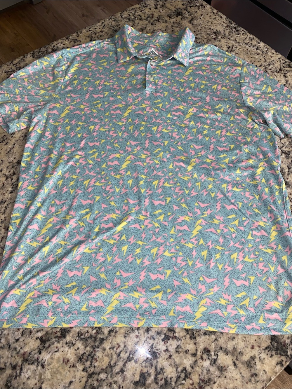 BURLEBO Men's Pastel Teal Polo with Pink & Yellow Graphic Print